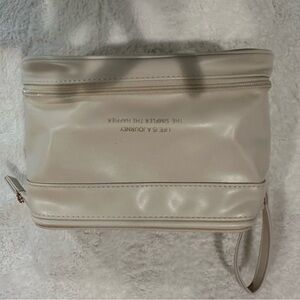 Brand new Cream makeup bag